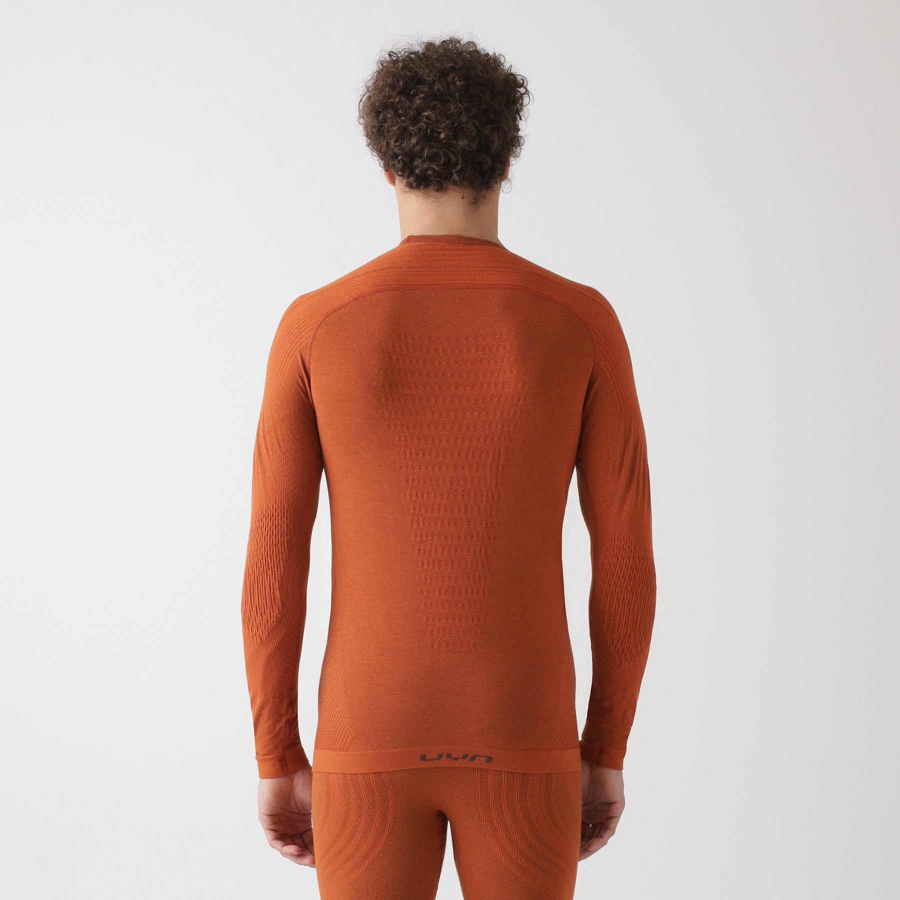 uyn-thermoshirt-herren-orange-rückansicht